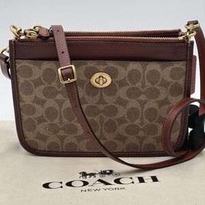 Coach Slim Turnlock Crossbody Bag Brown Signature
